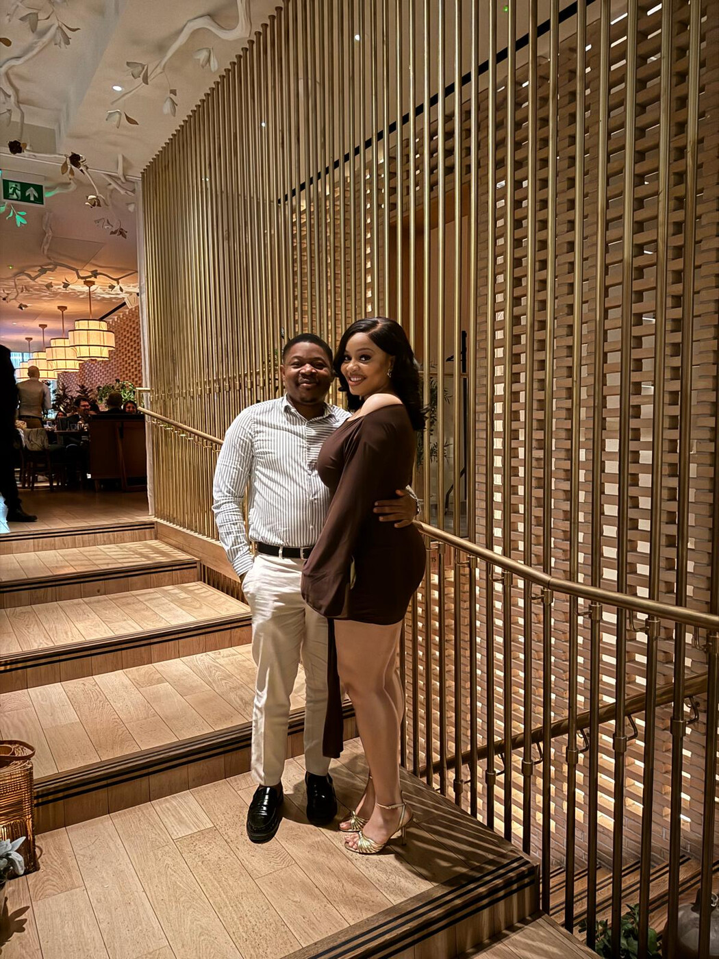 On the stairs at a restaurant